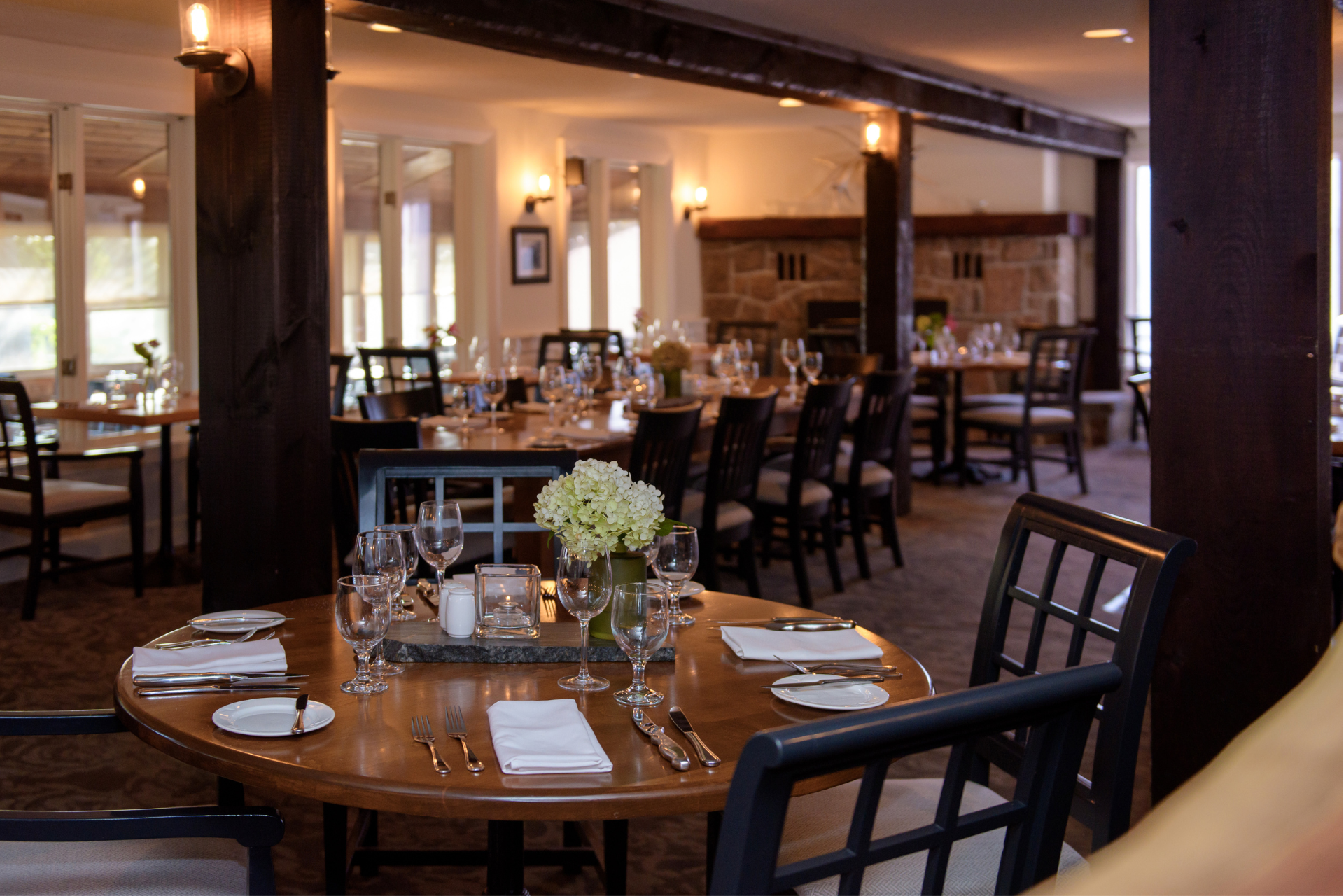 A round set table in a loghouse restaurant